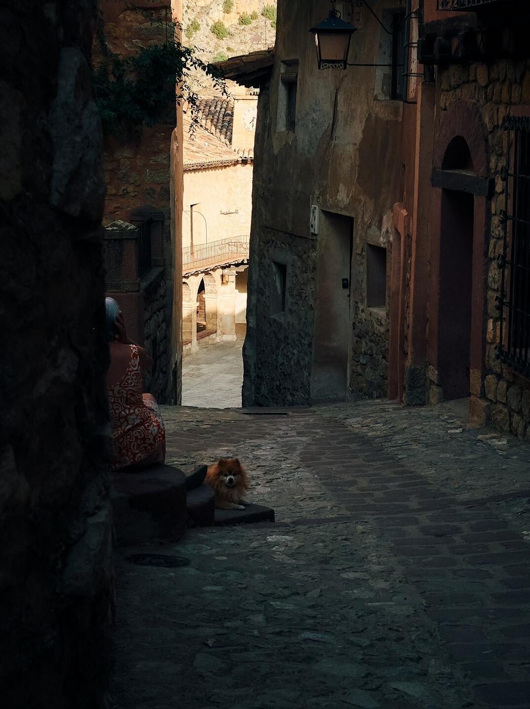 Photographer interviewing a resident in a small town